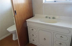 bathroom with shower and toilet